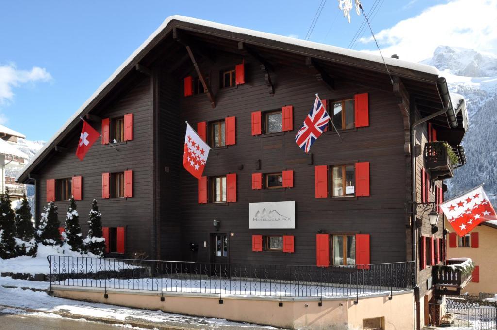Hotel De La Paix Champery Bagian luar foto